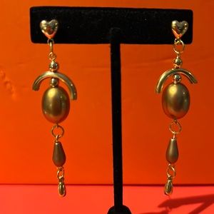 Gold tone dangle earrings